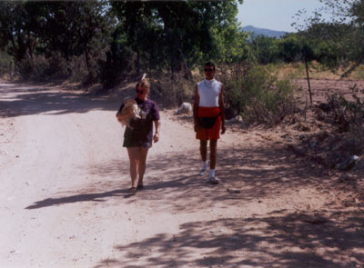 Anni Adkins with Maurice on the road by Georgia O'Keeffe's House